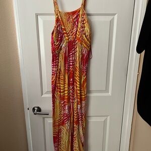 Woman’s summer dress polyester.. great as a dress or swim coverup. Size xl long